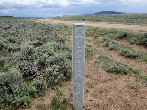 GDMBR: Same Marker - California Trail and Oregon Trail - the ruts in the foreground are the actual wagon wheel ruts.